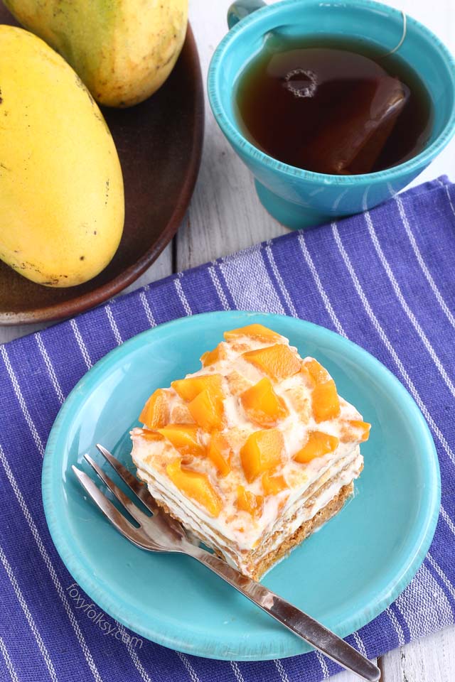 Mango float could be the easiest delicious no-bake dessert you will ever make. Only needs 4 ingredients too! Try it now! | www.foxyfolksy.com