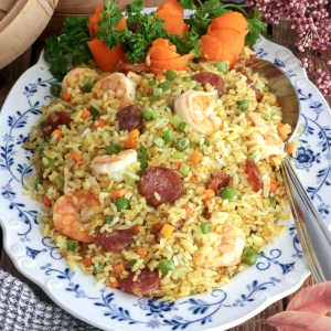 Yang Chow loaded with shrimp, Chinese sausage, eggs, green peas, and carrots.